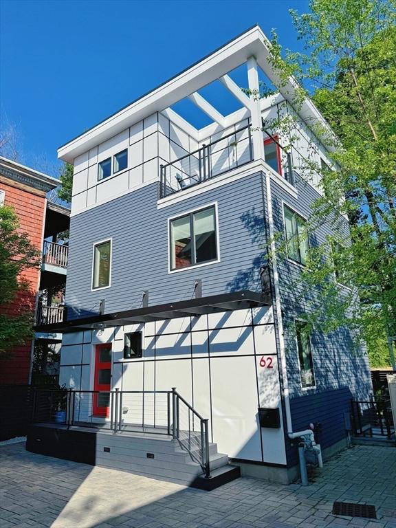 62 Pearl Unit 62, Cambridge, MA 02139 - back of house with a balcony