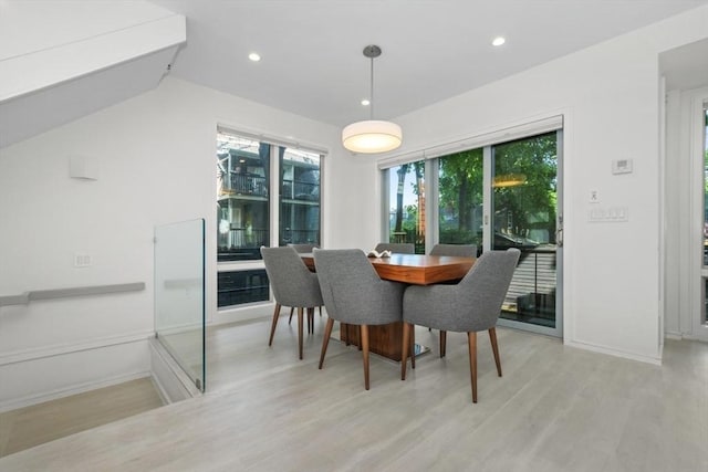 62 Pearl Unit 62, Cambridge, MA 02139 - dining room with light wood finished floors, plenty of natural light, recessed lighting, baseboards, and vaulted ceiling
