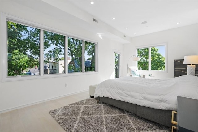 62 Pearl Unit 62, Cambridge, MA 02139 - bedroom with wood finished floors, recessed lighting, and baseboards