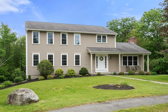 8 Brian Cir, Grafton, MA 01519 - colonial inspired home featuring a chimney and a front lawn