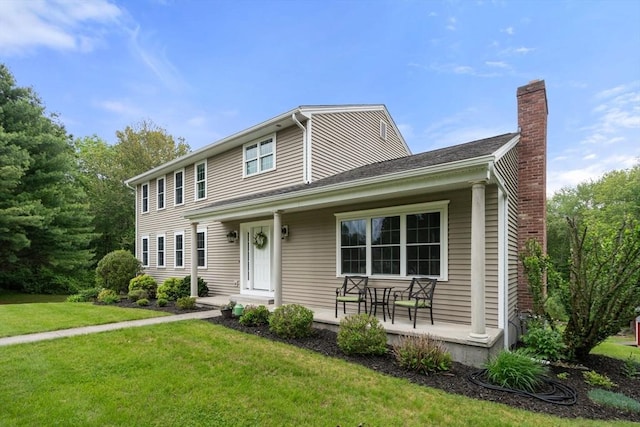 8 Brian Cir, Grafton, MA 01519 - view of front of property featuring a porch, a front lawn, and a chimney