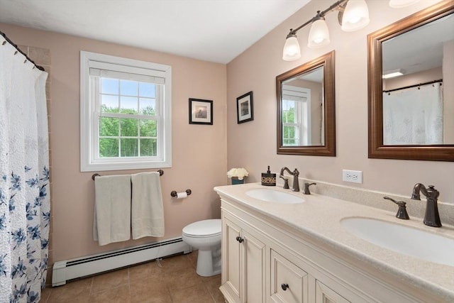 8 Brian Cir, Grafton, MA 01519 - full bathroom with a baseboard heating unit, double vanity, toilet, tile patterned flooring, and a shower with shower curtain