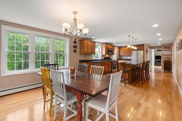 8 Brian Cir, Grafton, MA 01519 - dining room with a chandelier, light wood finished floors, recessed lighting, a baseboard radiator, and baseboards