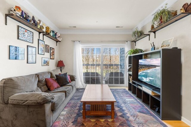 living room featuring ornamental molding