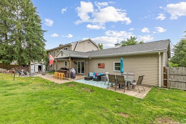 15 Bunny Ln, Brooklyn, CT 06234 - back of house featuring a patio area, a chimney, and an outdoor living space