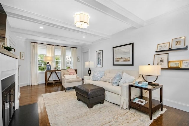 living room with wood finished floors, beam ceiling, baseboards, a fireplace, and recessed lighting