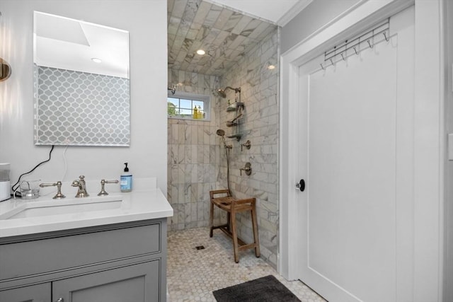 full bath featuring a walk in shower and vanity
