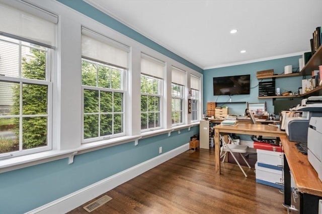 home office with ornamental molding, healthy amount of natural light, dark wood finished floors, baseboards, and recessed lighting