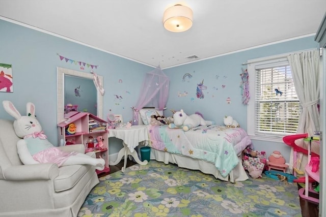 bedroom with ornamental molding