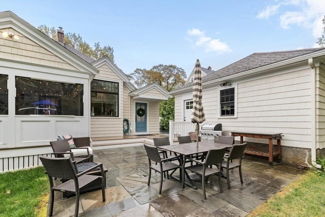 view of patio / terrace with grilling area and outdoor dining area