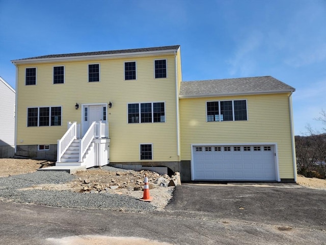 53 Kelly Ln, Lynn, MA 01904 - colonial house with a garage and aphalt driveway