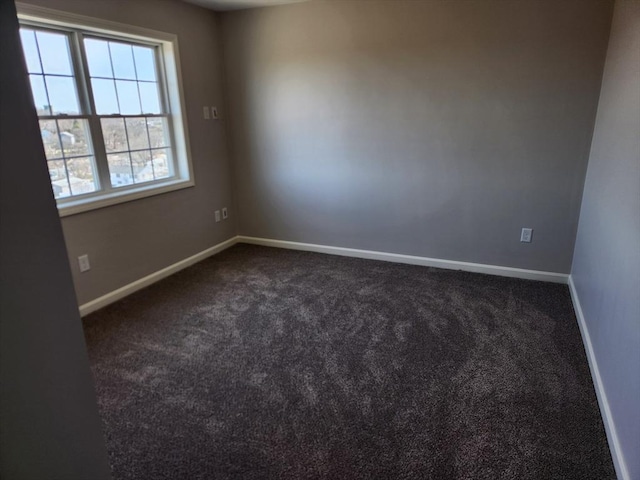 53 Kelly Ln, Lynn, MA 01904 - unfurnished room with baseboards and dark carpet