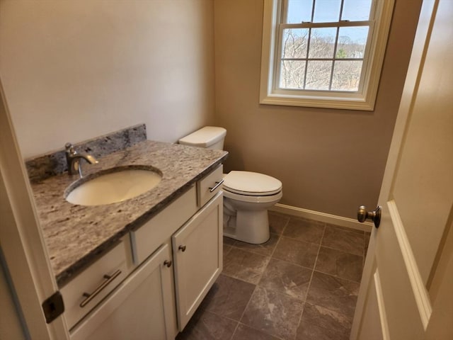 53 Kelly Ln, Lynn, MA 01904 - half bath with vanity, baseboards, and toilet