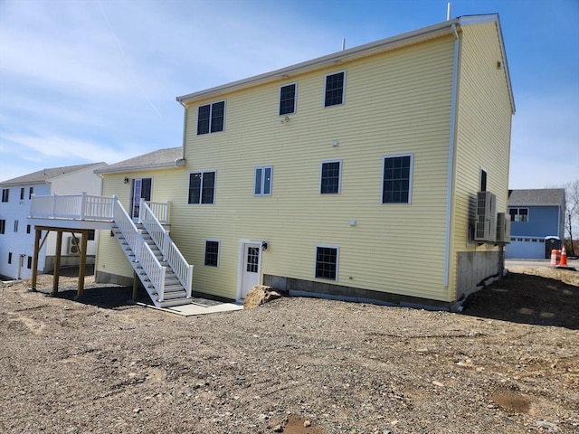 53 Kelly Ln, Lynn, MA 01904 - rear view of property featuring stairs and a deck