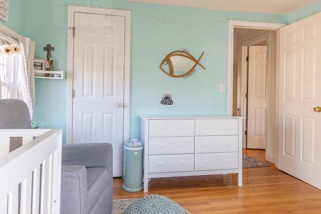 bedroom featuring light wood finished floors