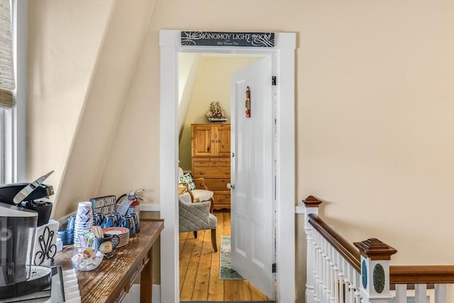 hall featuring wood-type flooring