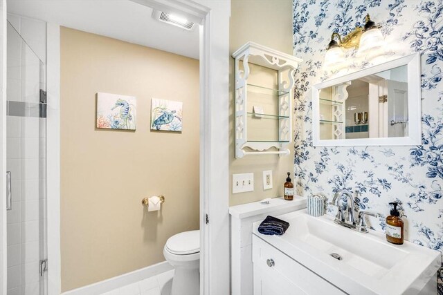 full bath with toilet, baseboards, wallpapered walls, and vanity