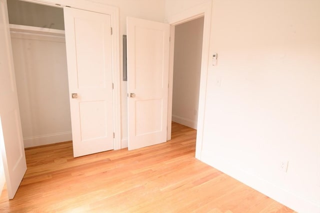8 Brookside Ave Unit 2, Boston, MA 02130 - unfurnished bedroom featuring light wood-type flooring, baseboards, and a closet