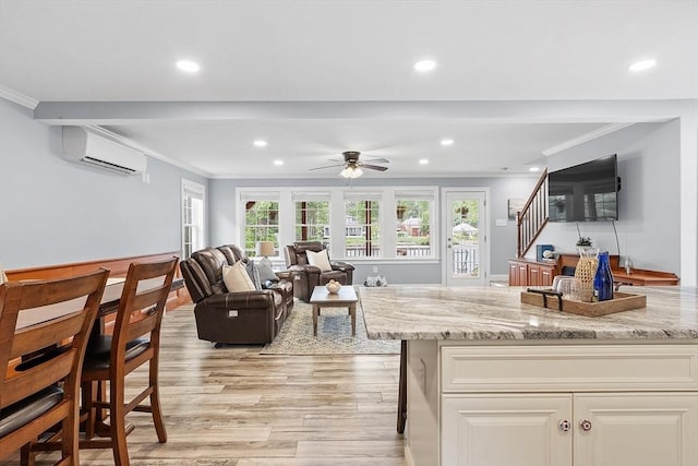 33 N Shore Rd, Westminster, MA 01473 - living area featuring an AC wall unit, crown molding, light wood finished floors, recessed lighting, and stairway