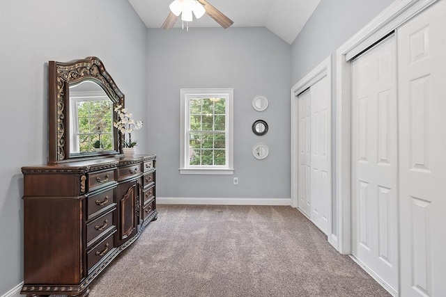 33 N Shore Rd, Westminster, MA 01473 - carpeted bedroom featuring lofted ceiling, two closets, multiple windows, and ceiling fan