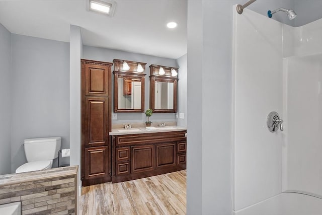 33 N Shore Rd, Westminster, MA 01473 - bathroom with double vanity, a shower, wood finished floors, and recessed lighting