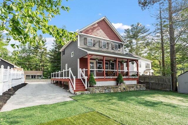 33 N Shore Rd, Westminster, MA 01473 - rear view of house with an outdoor structure, a porch, and driveway