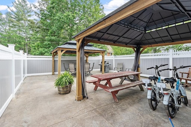 33 N Shore Rd, Westminster, MA 01473 - fenced backyard featuring a gazebo, a patio, and grilling area