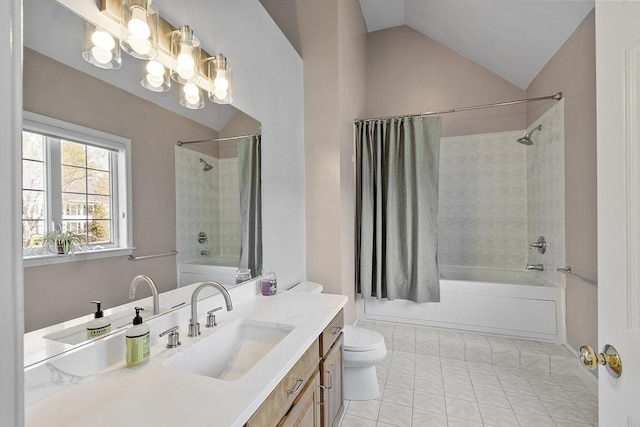 bathroom featuring an inviting chandelier, shower / bath combo, vanity, toilet, and lofted ceiling