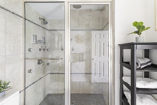 full bathroom with a stall shower