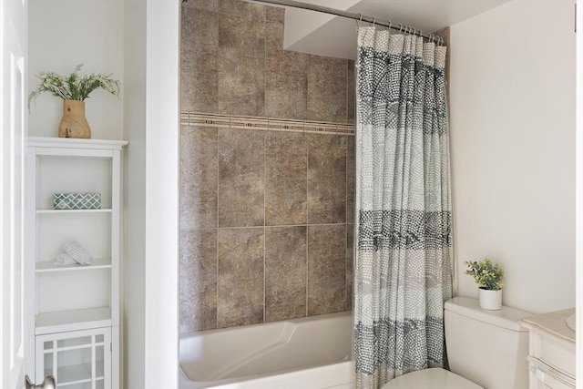 full bath featuring toilet, shower / tub combo with curtain, and vanity