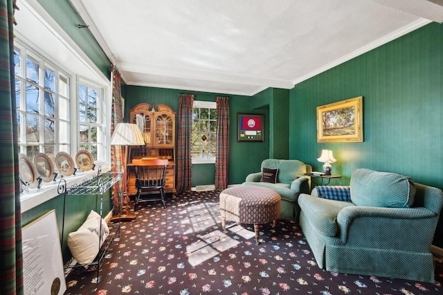 sitting room featuring carpet and ornamental molding