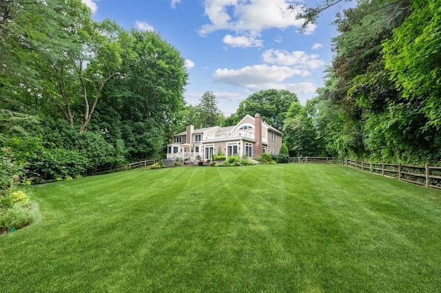 view of yard featuring a fenced backyard