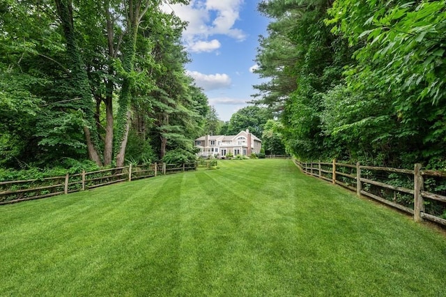 view of yard with fence