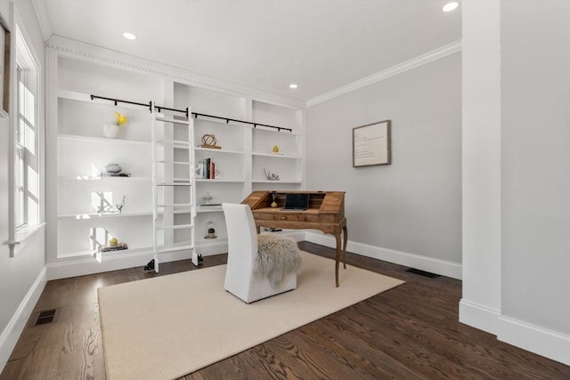 office space with ornamental molding, dark hardwood / wood-style floors, and a barn door