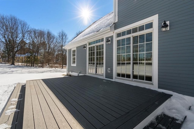 view of snow covered deck