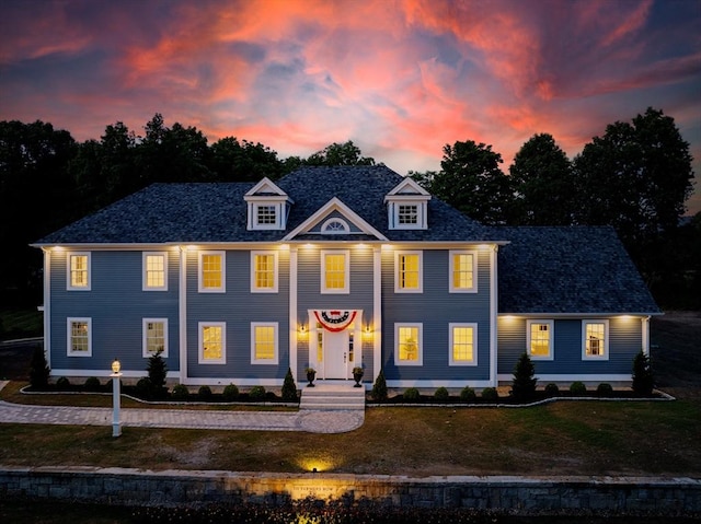 colonial house with a lawn