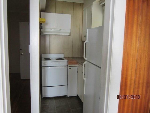 16 Chestnut, Wakefield, MA 01880 - kitchen with white appliances, under cabinet range hood, and light countertops
