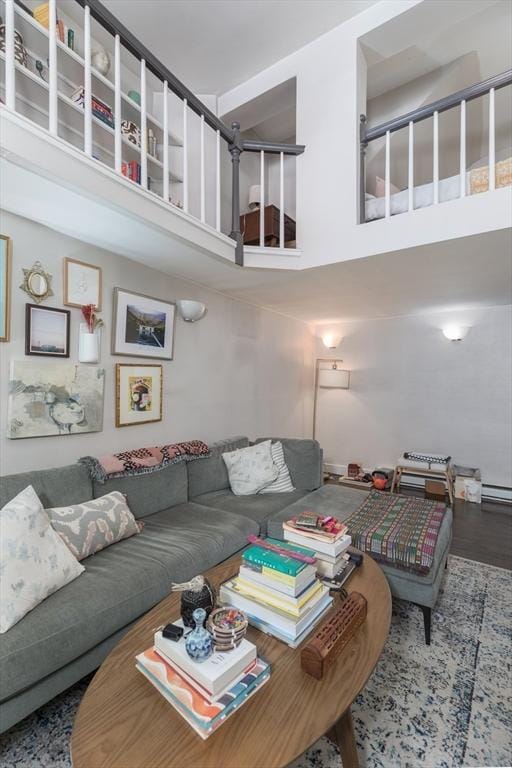 living area featuring a high ceiling