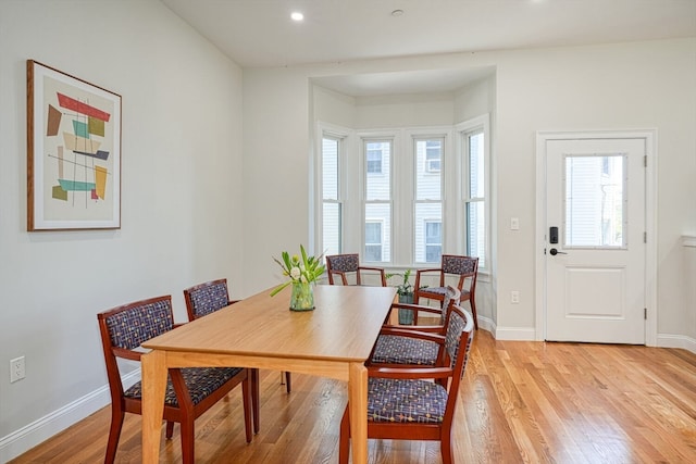 dining room featuring light hardwood / wood-style floors