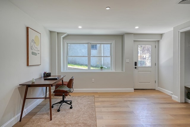 home office featuring light hardwood / wood-style flooring