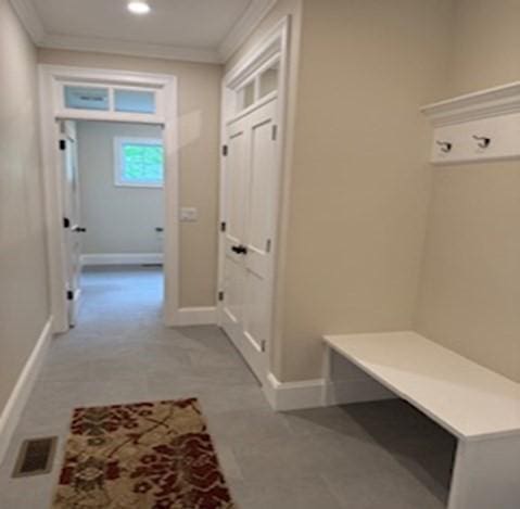 220 Mill St, Burlington, MA 01803 - mudroom with ornamental molding, baseboards, and recessed lighting