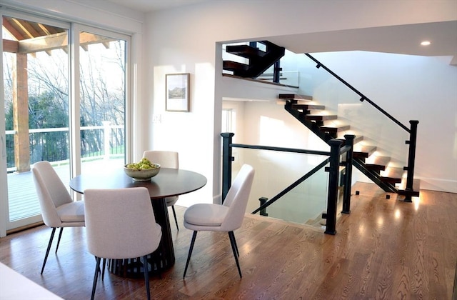 dining room with hardwood / wood-style flooring