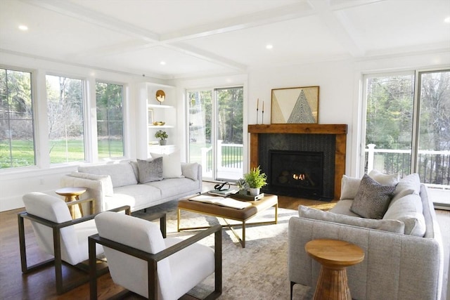 sunroom / solarium featuring beamed ceiling and coffered ceiling