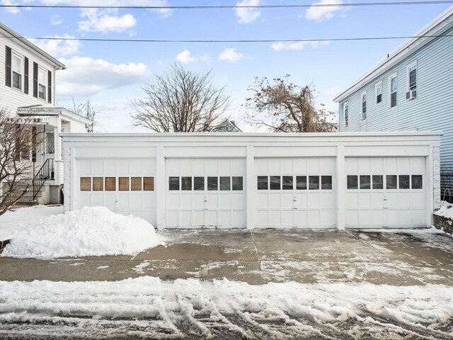 view of snow covered garage