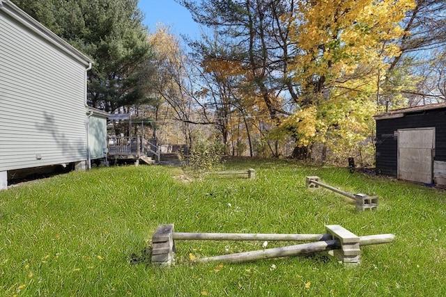 view of yard featuring a deck