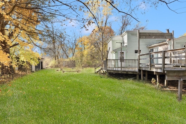 view of yard with a wooden deck