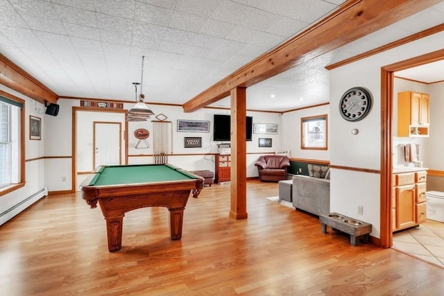 game room with billiards, ornamental molding, a baseboard radiator, and light hardwood / wood-style flooring