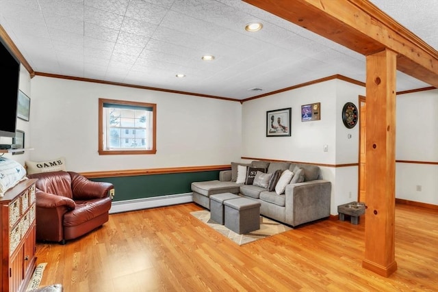 living room featuring crown molding, a baseboard radiator, and light hardwood / wood-style floors