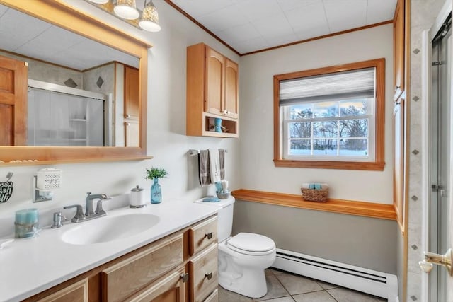 bathroom with vanity, an enclosed shower, crown molding, and baseboard heating