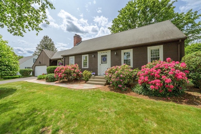 169 Mountainview Rd, East Longmeadow, MA 01028 - view of front facade with a garage, a chimney, and a front lawn